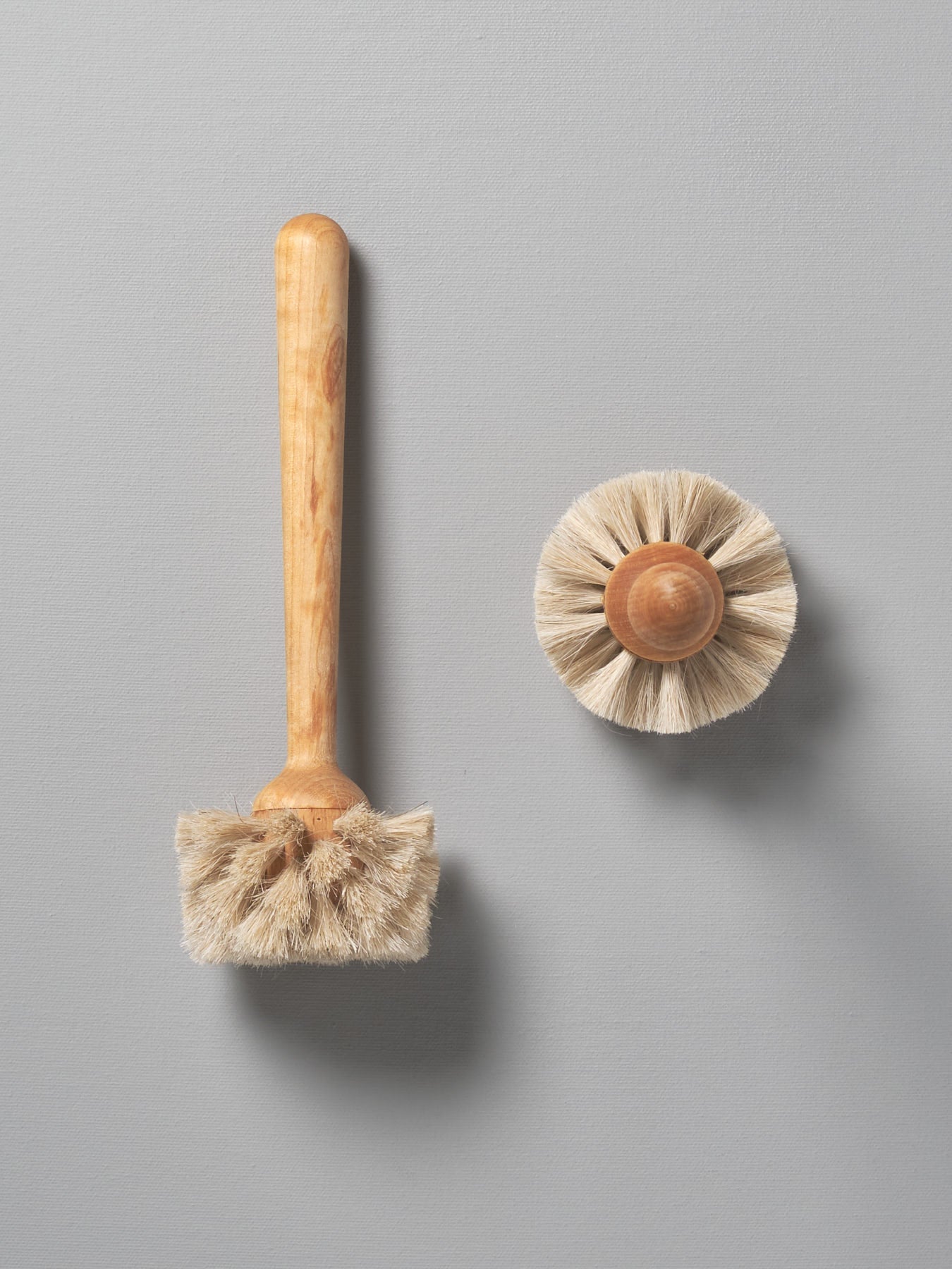 An Iris Hantverk glass brush and an Iris Hantverk glass brush next to each other.