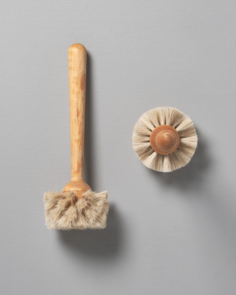 An Iris Hantverk glass brush and an Iris Hantverk glass brush next to each other.
