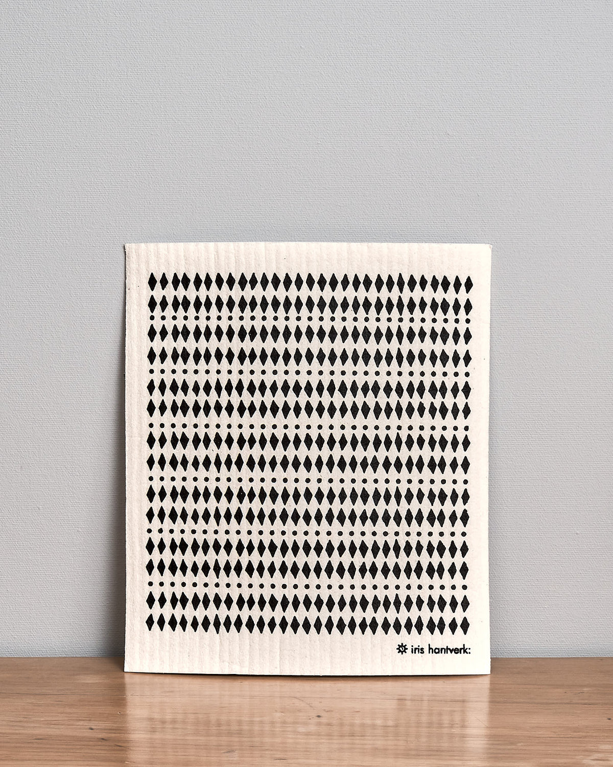 A black and white Household Cloth – Mini Diamond with dots on it, by Iris Hantverk.