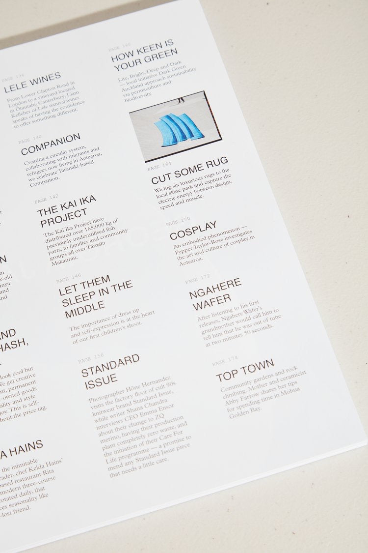 A white sheet of paper with different words on it, featuring the ISLAND Magazine – Issue 02 (Summer 2021/22) by ISLAND Magazine.