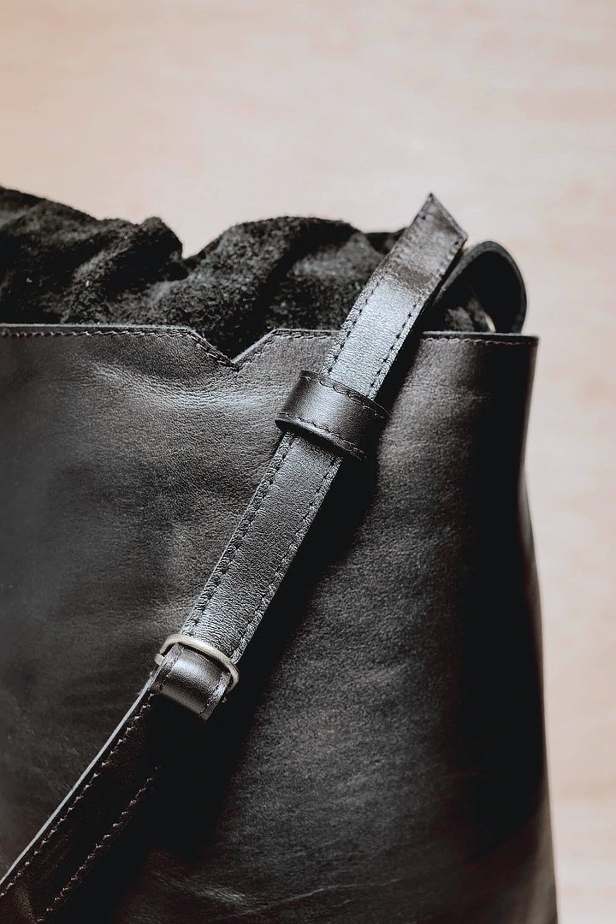 A Lets Dance black leather bag with a strap from Kohl &amp; Co.