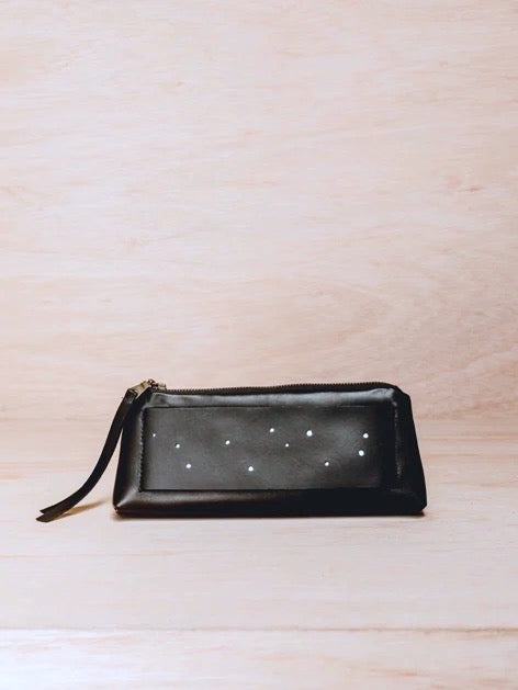A black leather Space Dust Wallet with stars on it by Kohl & Co.