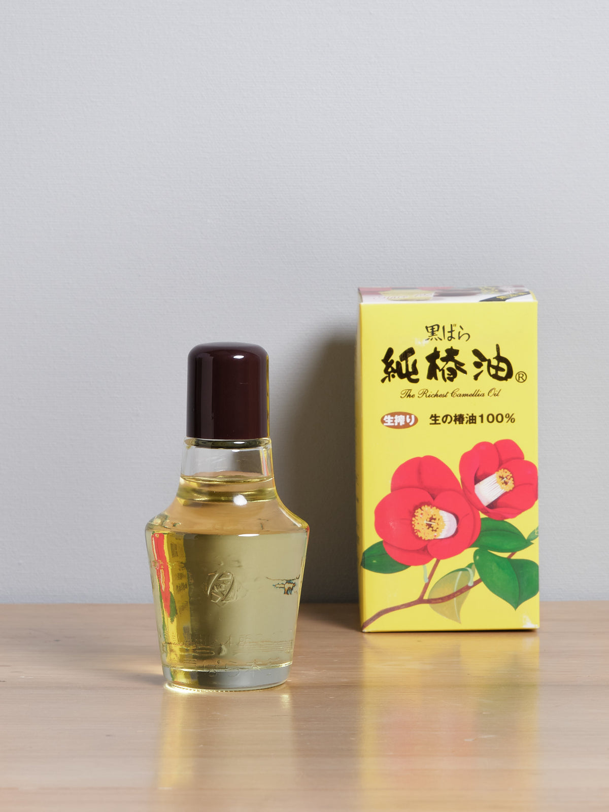 A bottle of Kurobara Camellia Oil for Carbon Steel Knives &amp; Tools next to a box.