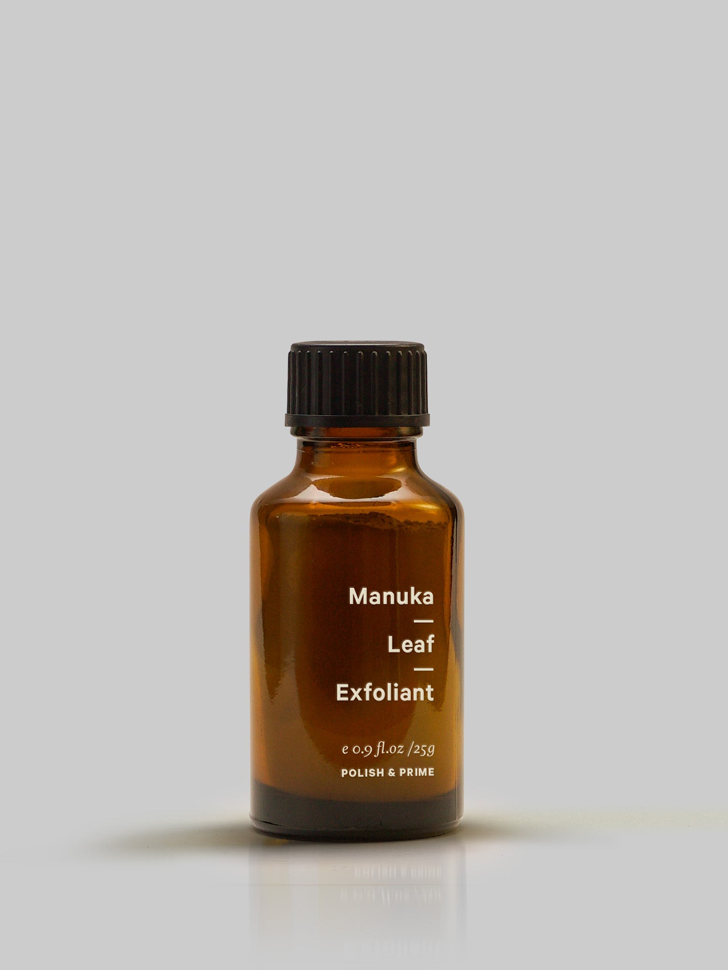 A bottle of Manuka Leaf – Exfoliant by MARYSE on a grey background.