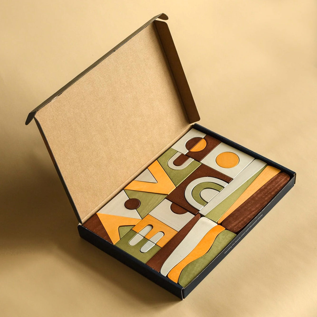 A MinMin Copenhagen wooden box with a Puzzle Game inside of it.