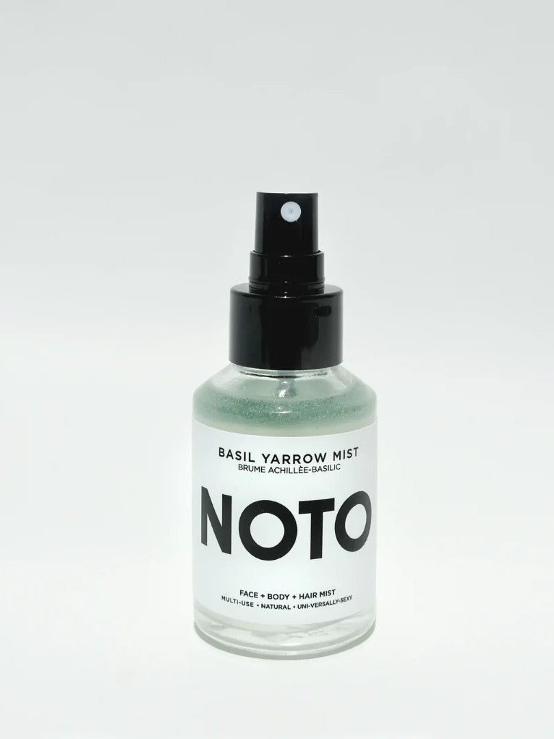 A bottle of Basil Yarrow Mist by NOTO on a white background.