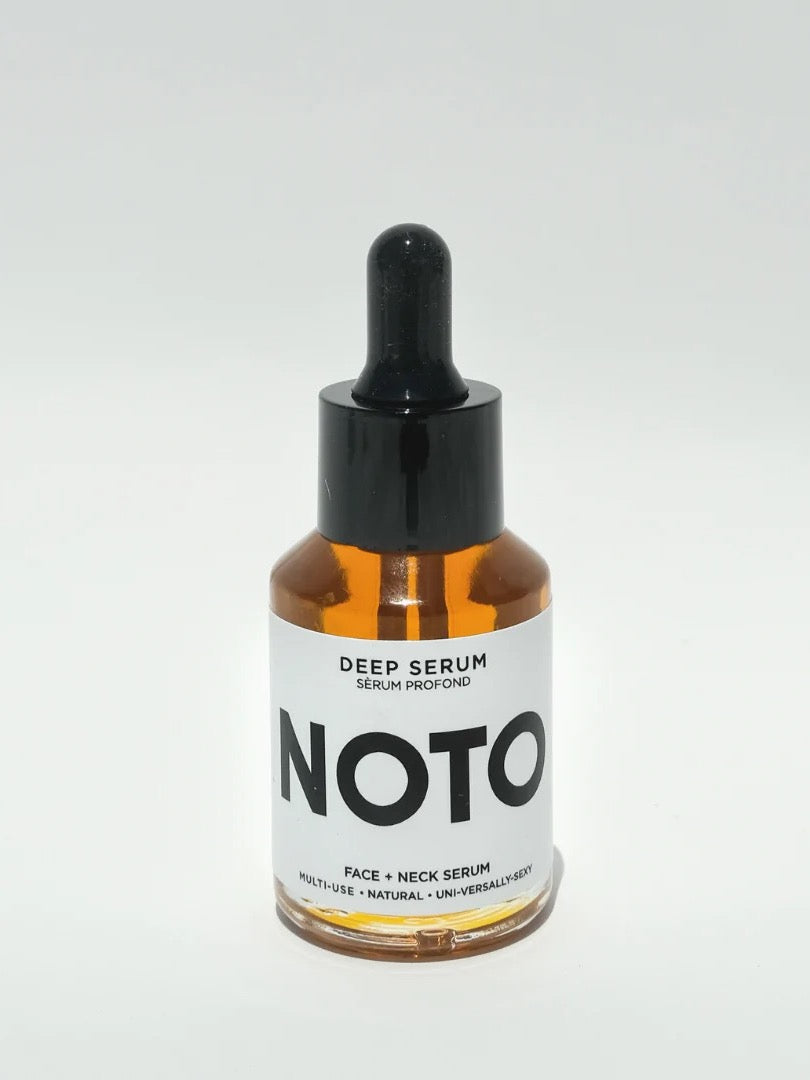 A bottle of Mini Deep Serum by NOTO on a white background.