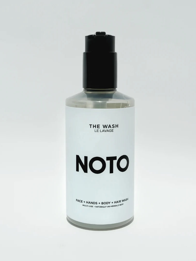A bottle of The Wash by NOTO on a white background.