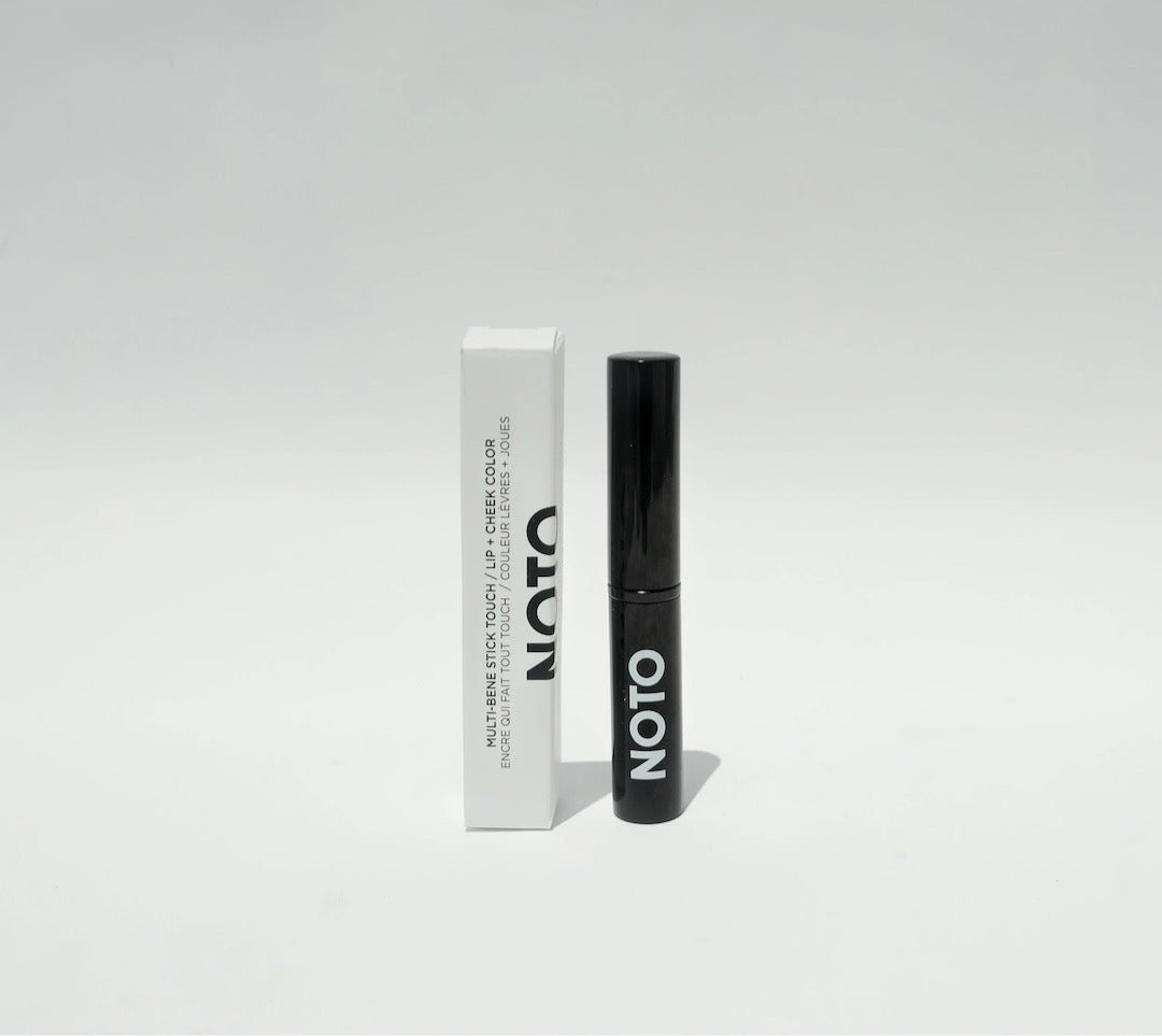 A Touch - Multi-Bene Stain Stick // Lips + Cheeks tube by NOTO on a white background.