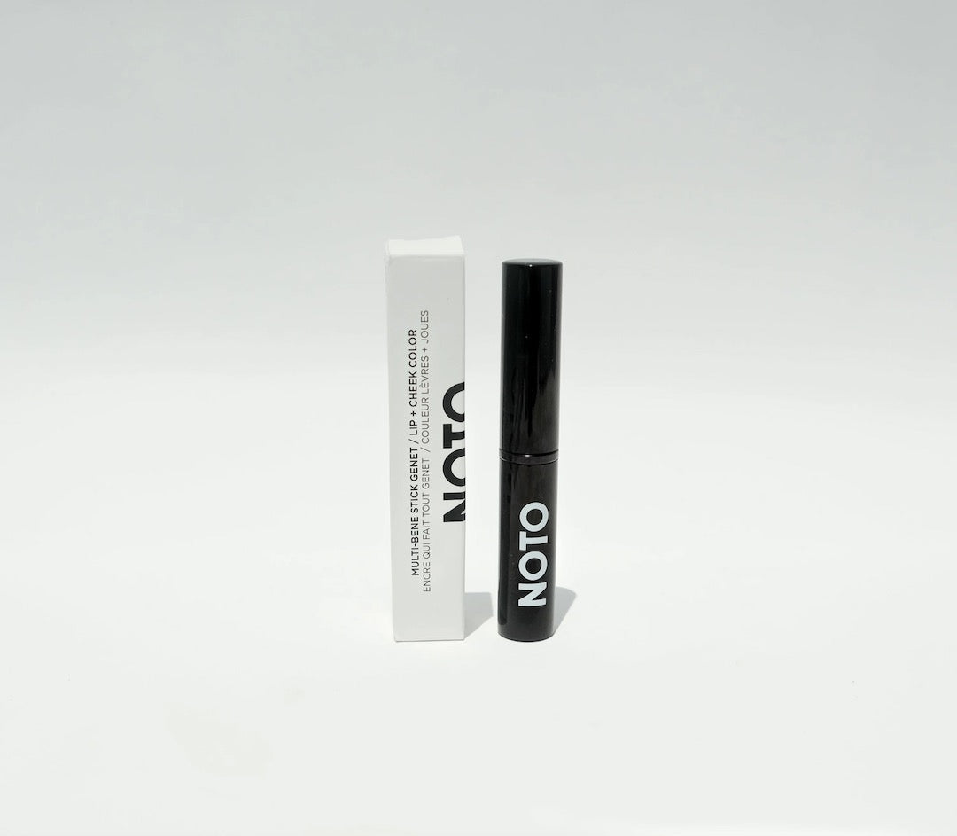 A Genet - Multi-Bene Stain Stick // Lips + Cheeks tube on a white background. (Brand Name: NOTO)