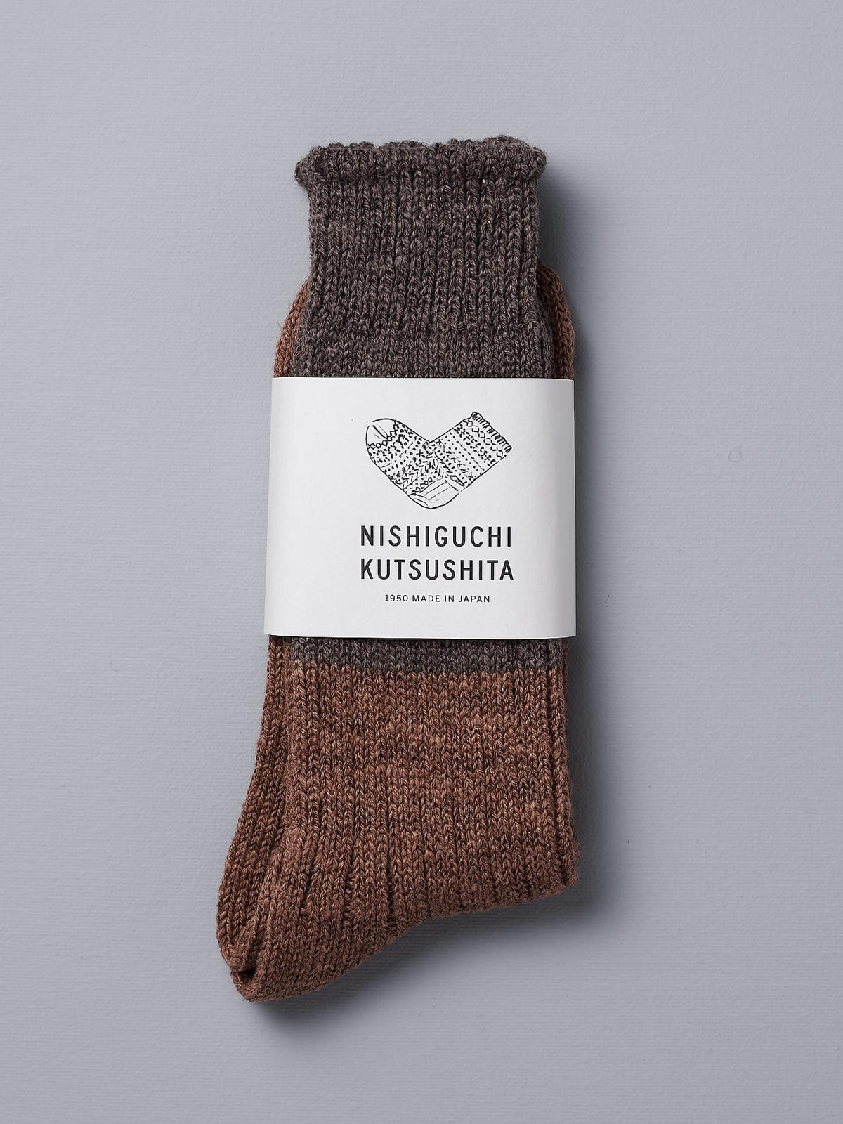 A pair of Boston Slab Socks - Brown Fawn by Nishiguchi Kutsushita.