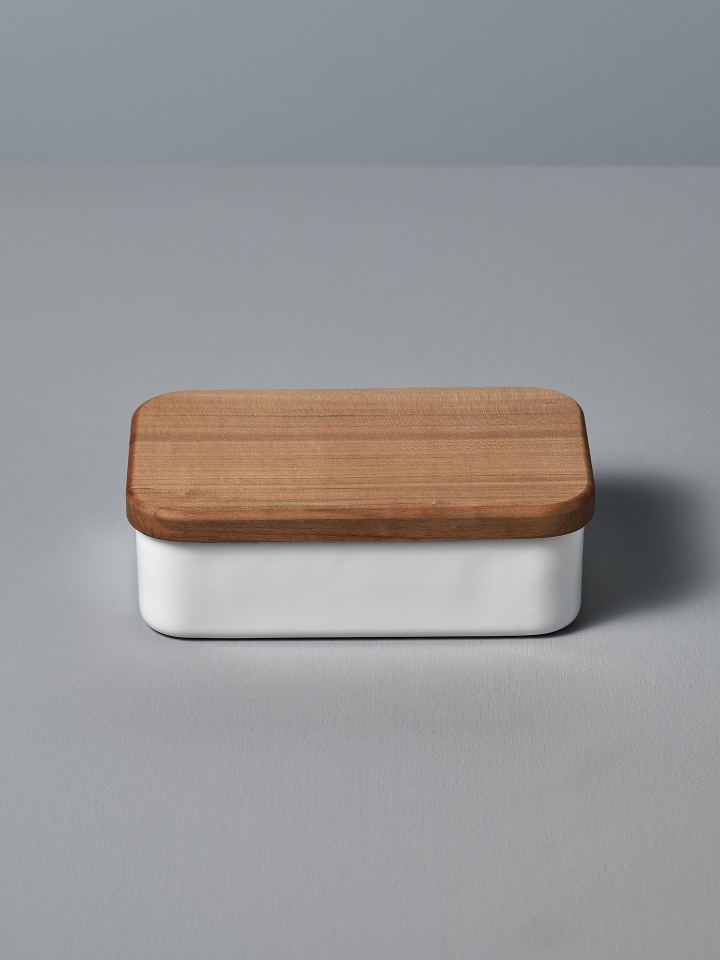 A small white Enamel Butter Case – 200𝚐 with a wooden lid by Noda Horo.