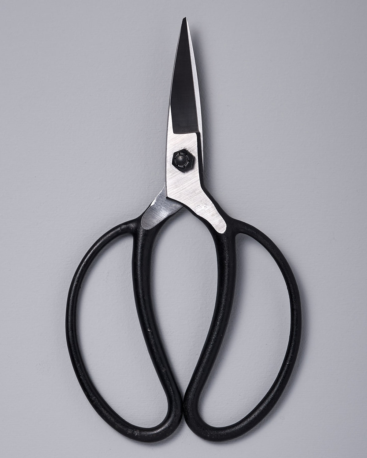 A pair of Okatsune Garden Scissors №203 – Large on a gray background.