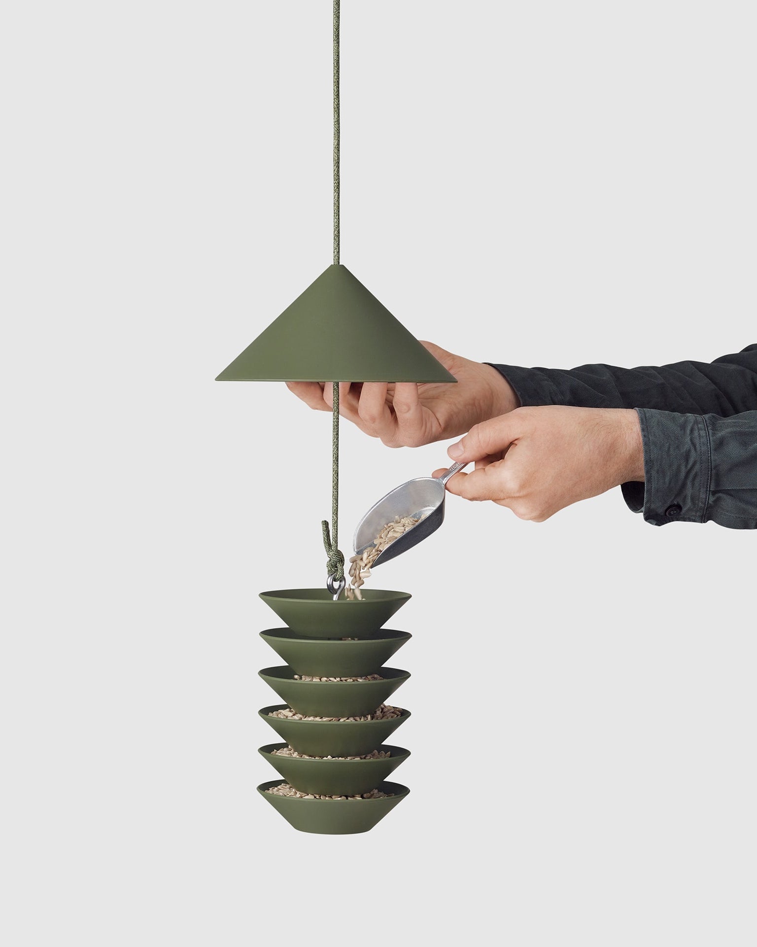A Bird Silo – Slate pendant light hanging from a grey background, by Pidät.