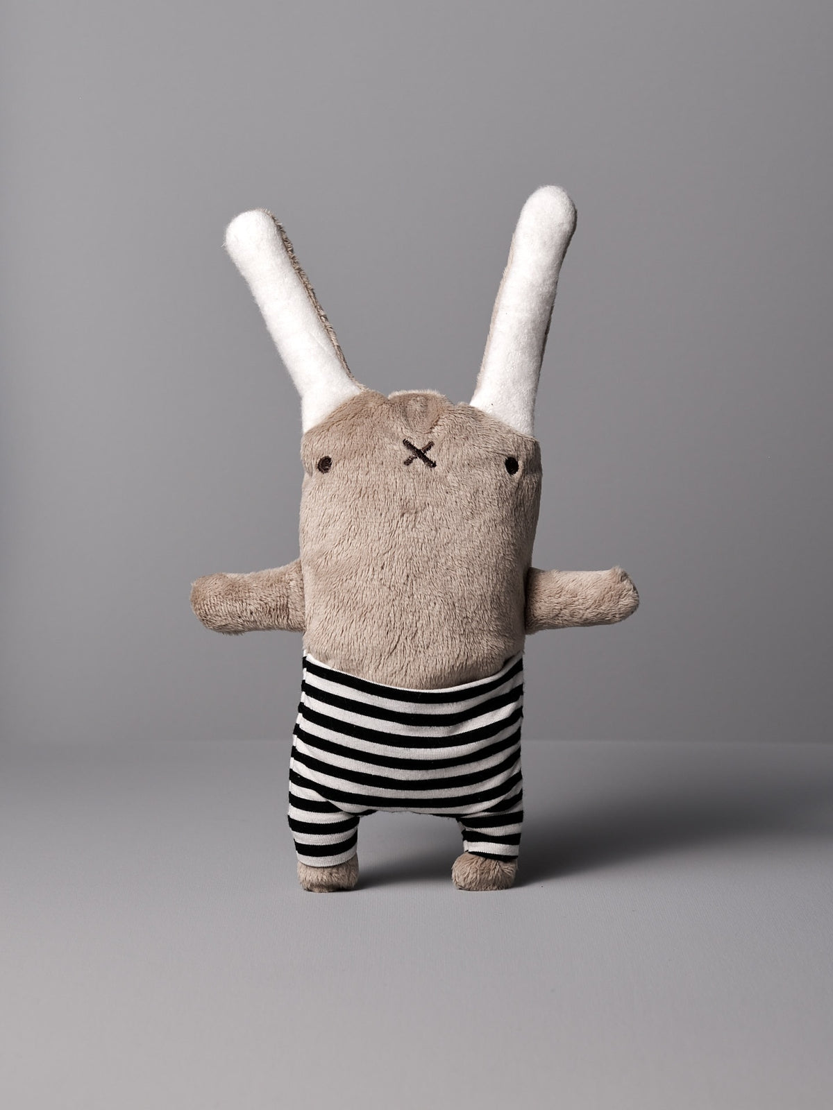 A Louise la Lapine stuffed animal with a striped shirt by Raplapla.