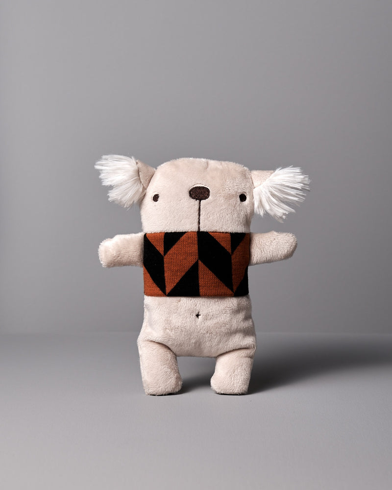 A Gilles le Koala No.2 stuffed animal with a brown and black scarf by Raplapla.