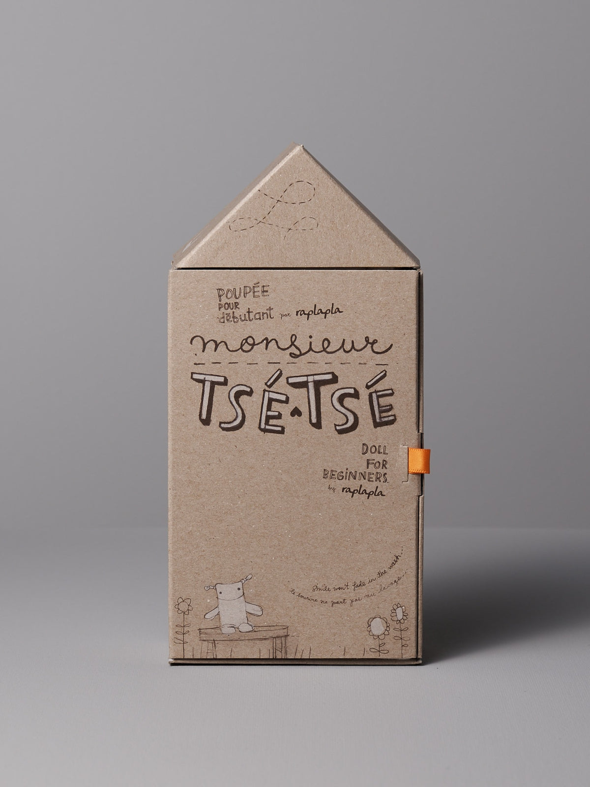 A Monsieur Tsé-Tsé Classic cardboard box with writing on it. (Brand: Raplapla)
