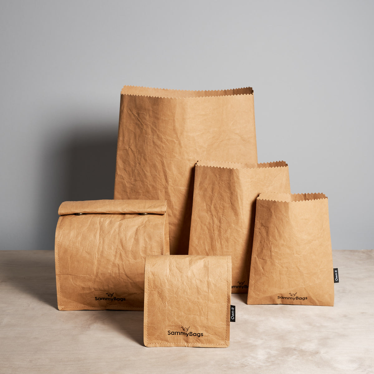 A group of Sammy Bags&#39; Reusable Flat Bag – XL on a table.