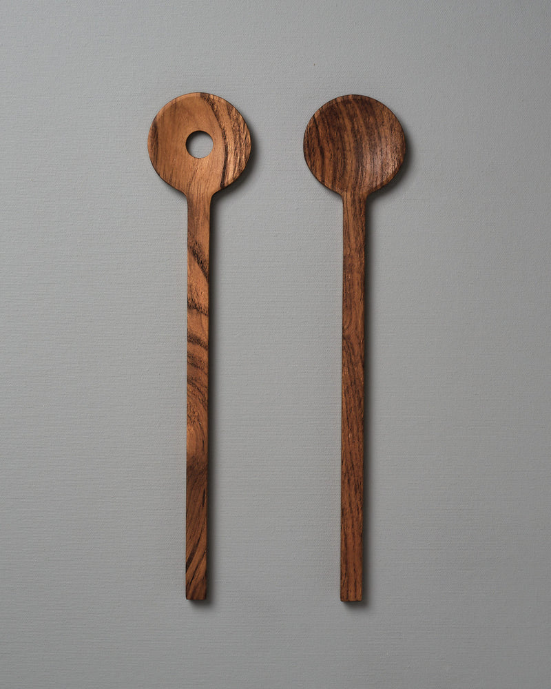 Two Fulla Salad Servers by Skagerak on a grey background.