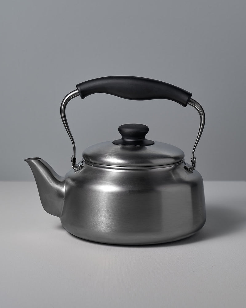 A Sori Yanagi Stove-top Kettle - Brushed Steel on a white background.