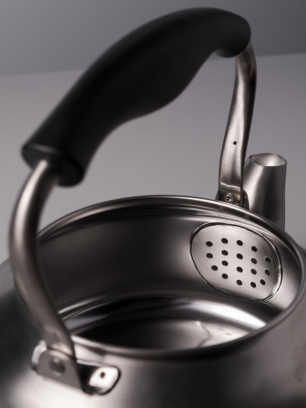 A Sori Yanagi Stove-top Kettle - Brushed Steel on a white background.