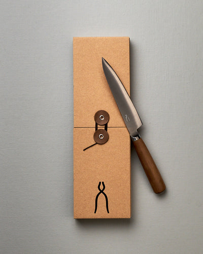 A brown box with a Tadafusa Hocho Petty Knife in it.