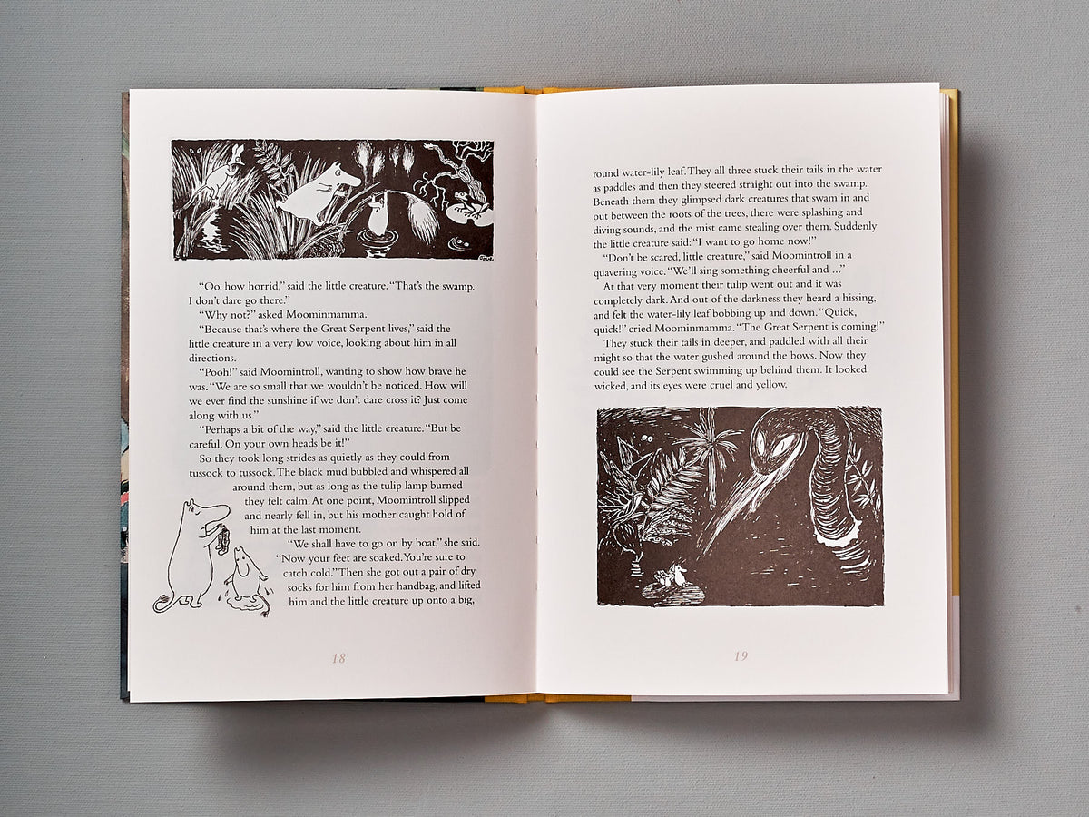 An open book of &quot;The Moomins and the Great Flood&quot; by Tove Jansson, with a black and white illustration.