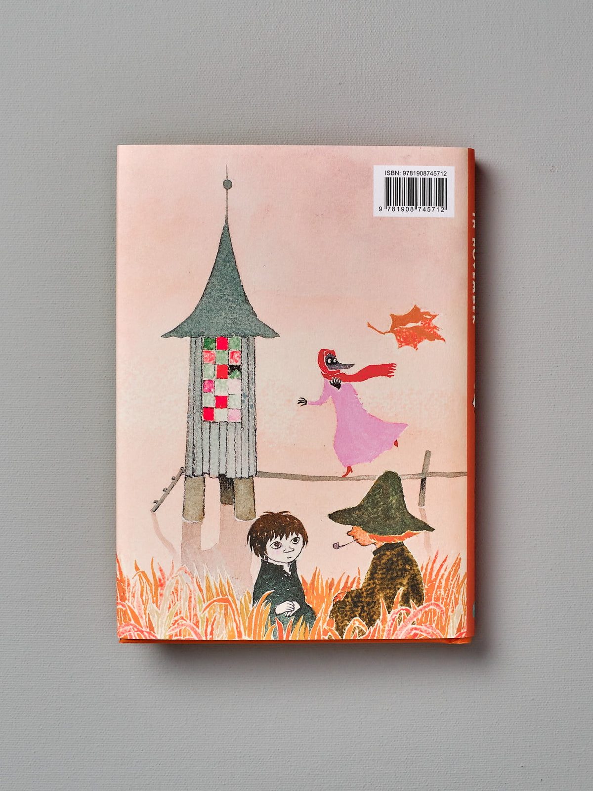 A Moominvalley in November children&#39;s book with a picture of a girl and a boy by Tove Jansson.