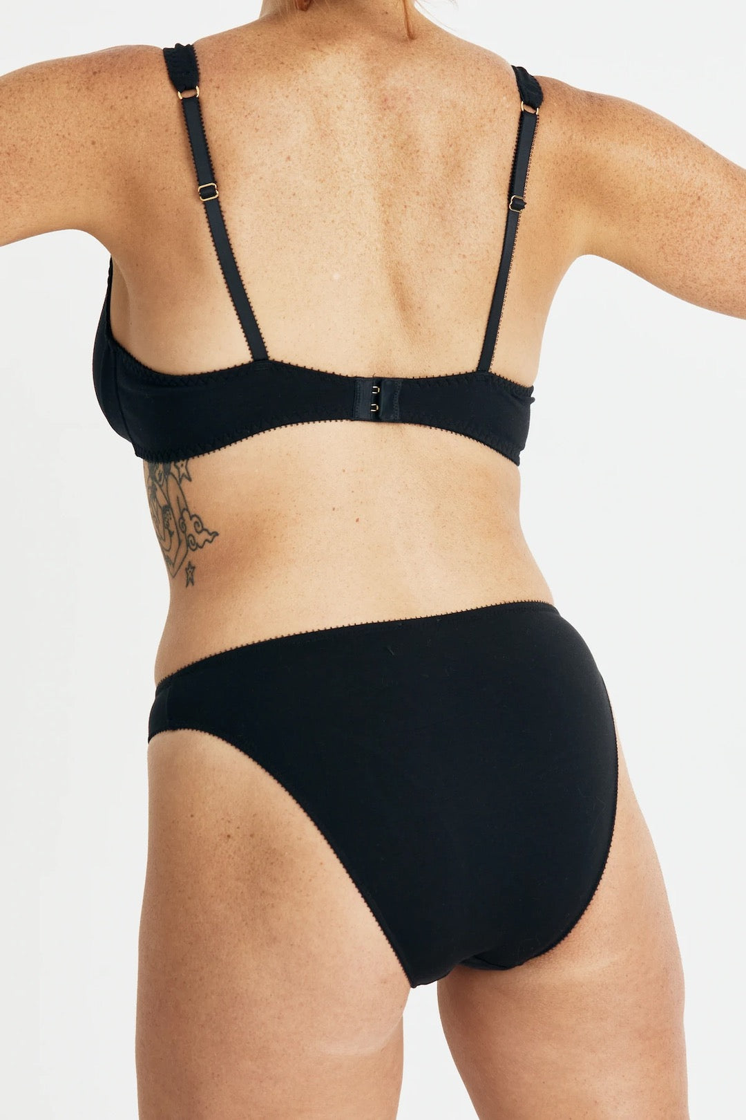 The back view of a woman wearing a Videris Sarah Bra – Shield bikini.