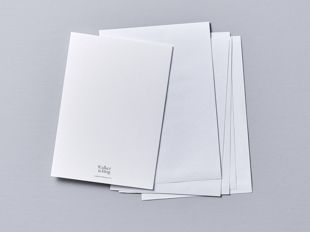 A stack of Walker &amp; Bing Greeting Cards – Leaf Stencil on a grey background.