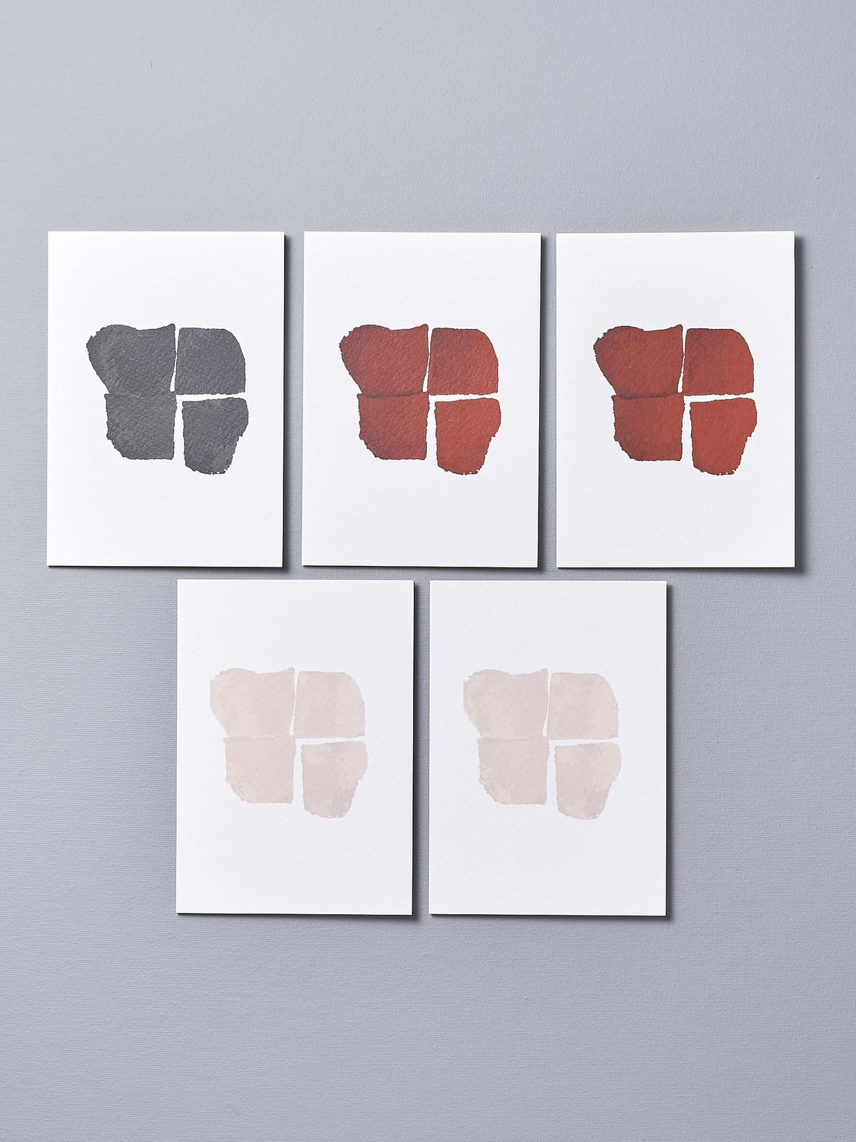 A set of four Greeting Cards – Heart Block by Walker &amp; Bing on a grey background.