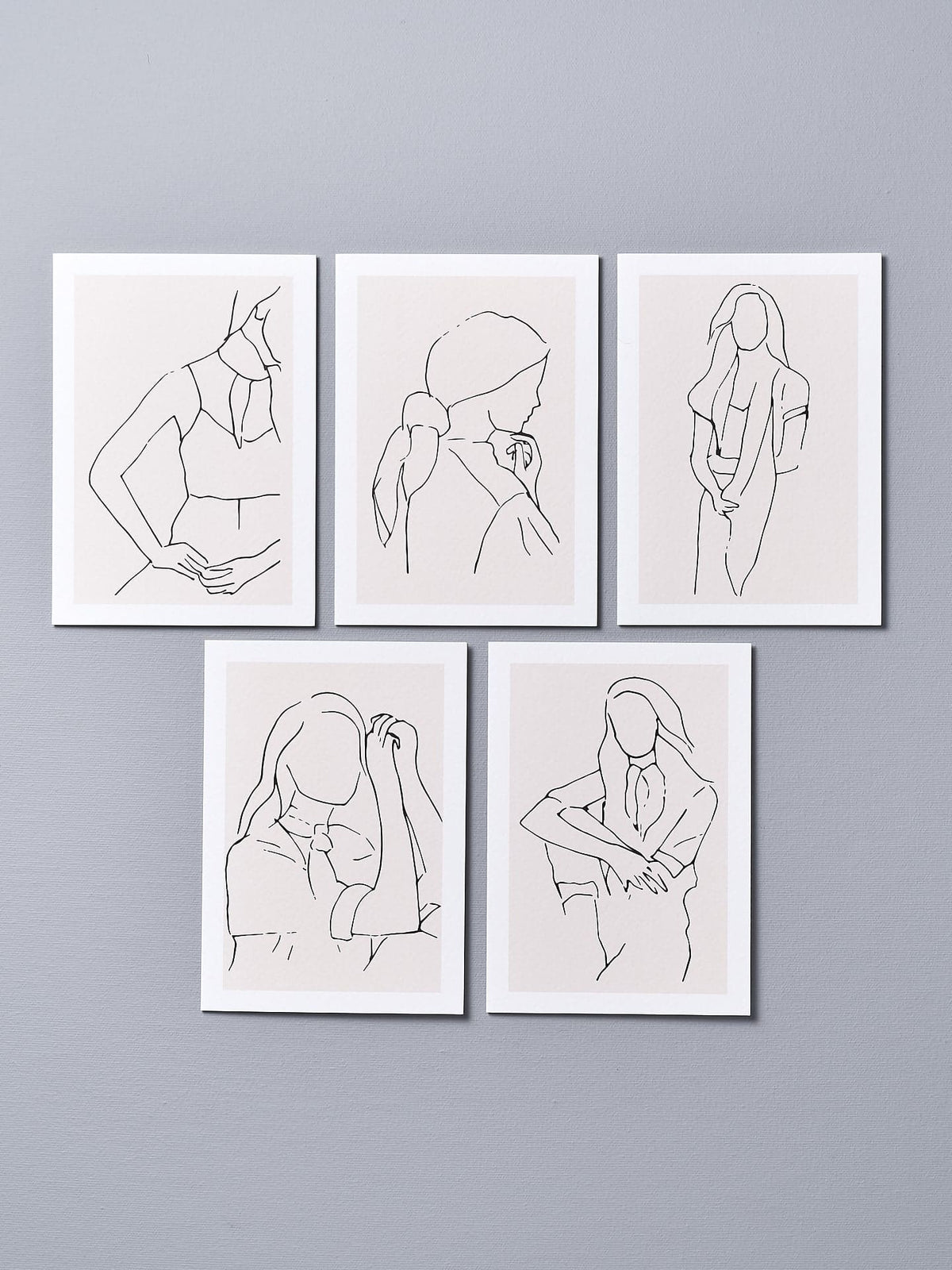 A set of four Greeting Cards - Line Drawing of a woman by Walker &amp; Bing.