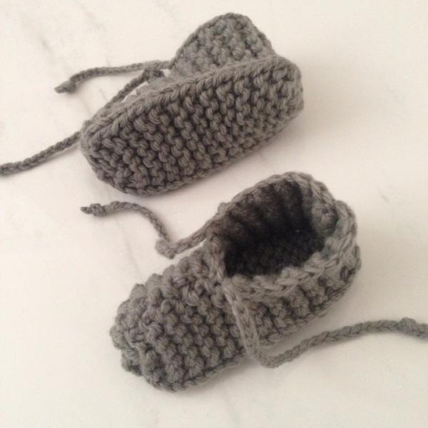 Two Weebits Hand Knitted Chunky Booties - Mushroom on a white surface.