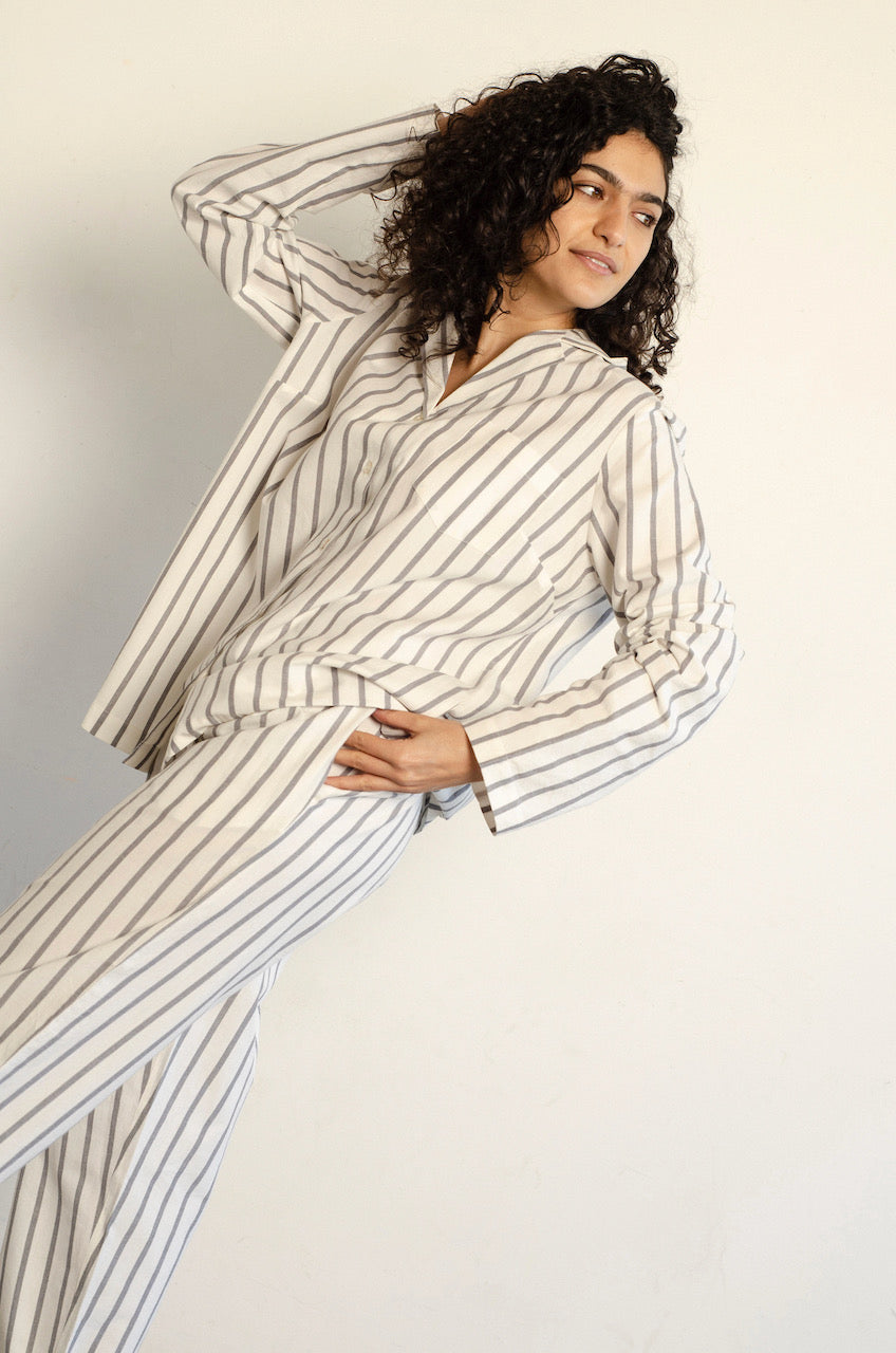 A woman wearing a white and grey striped Classic Set - Stripe by general sleep.