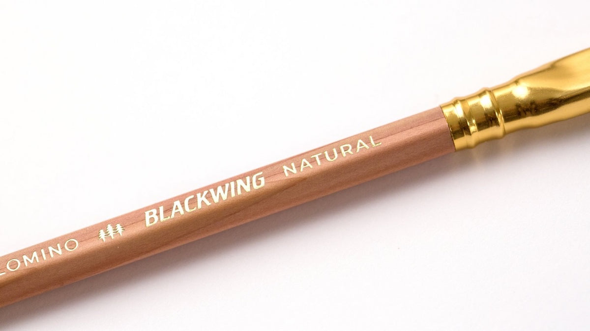 A Blackwing Natural Pencil with the brand name Palomino Blackwing on it.