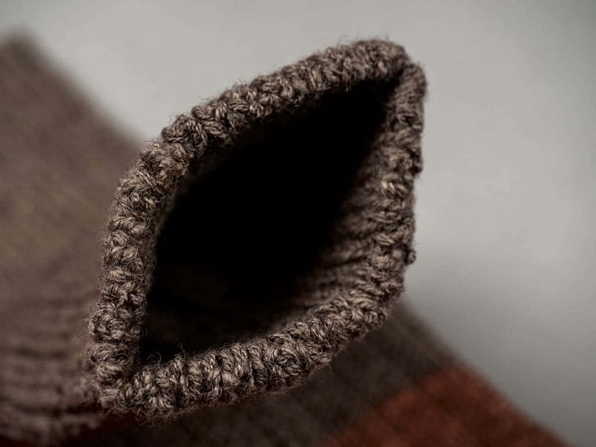 A close up of a Boston Slab Socks – Brown Fawn by Nishiguchi Kutsushita knitted sock.