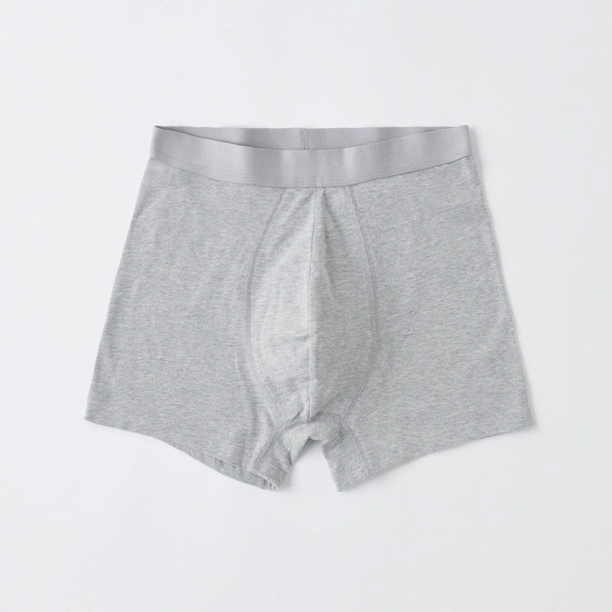 An Organic Basics men&#39;s grey boxer brief on a white background.